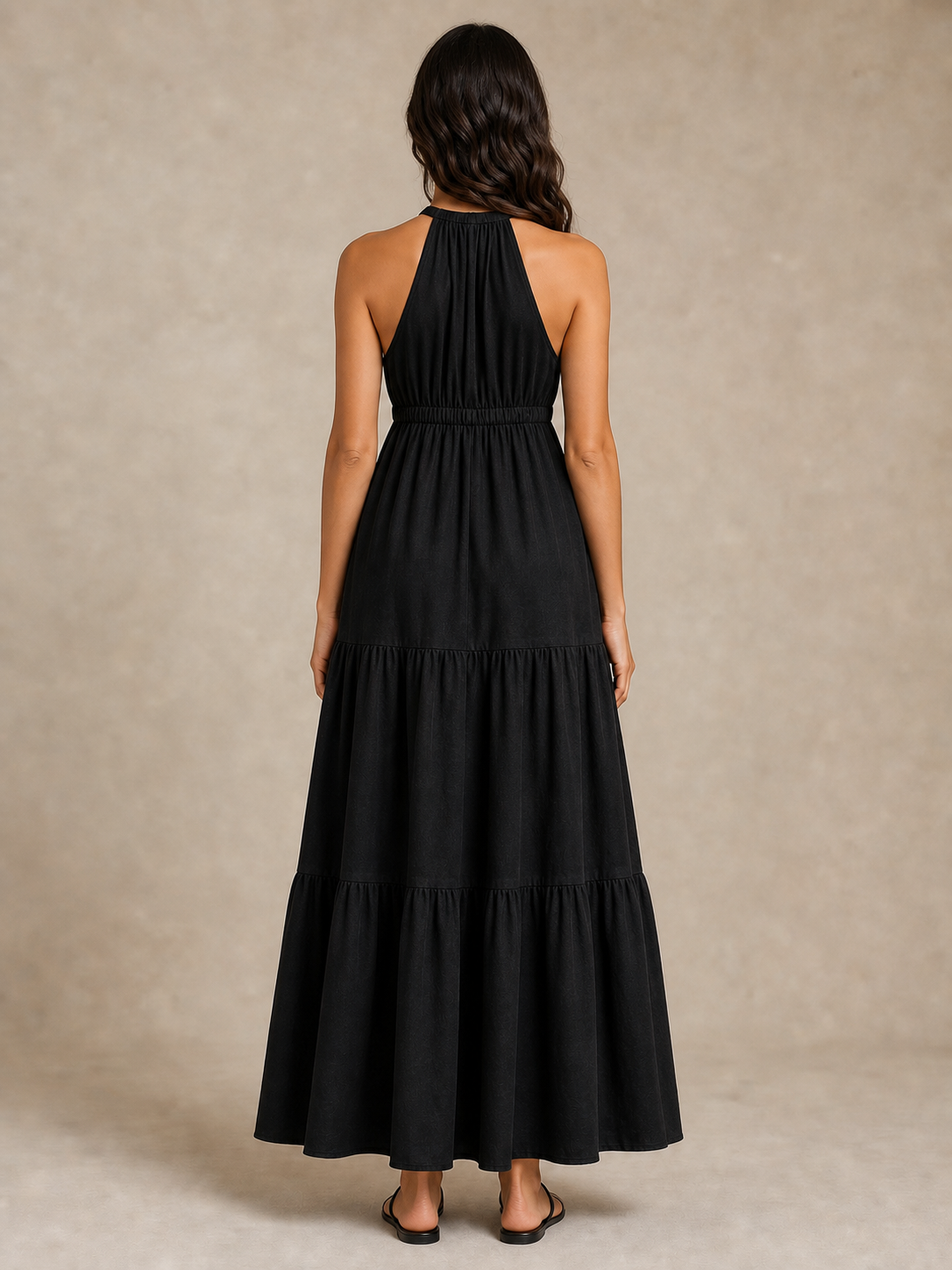 Women's black gathered halter tiered maxi dress back view