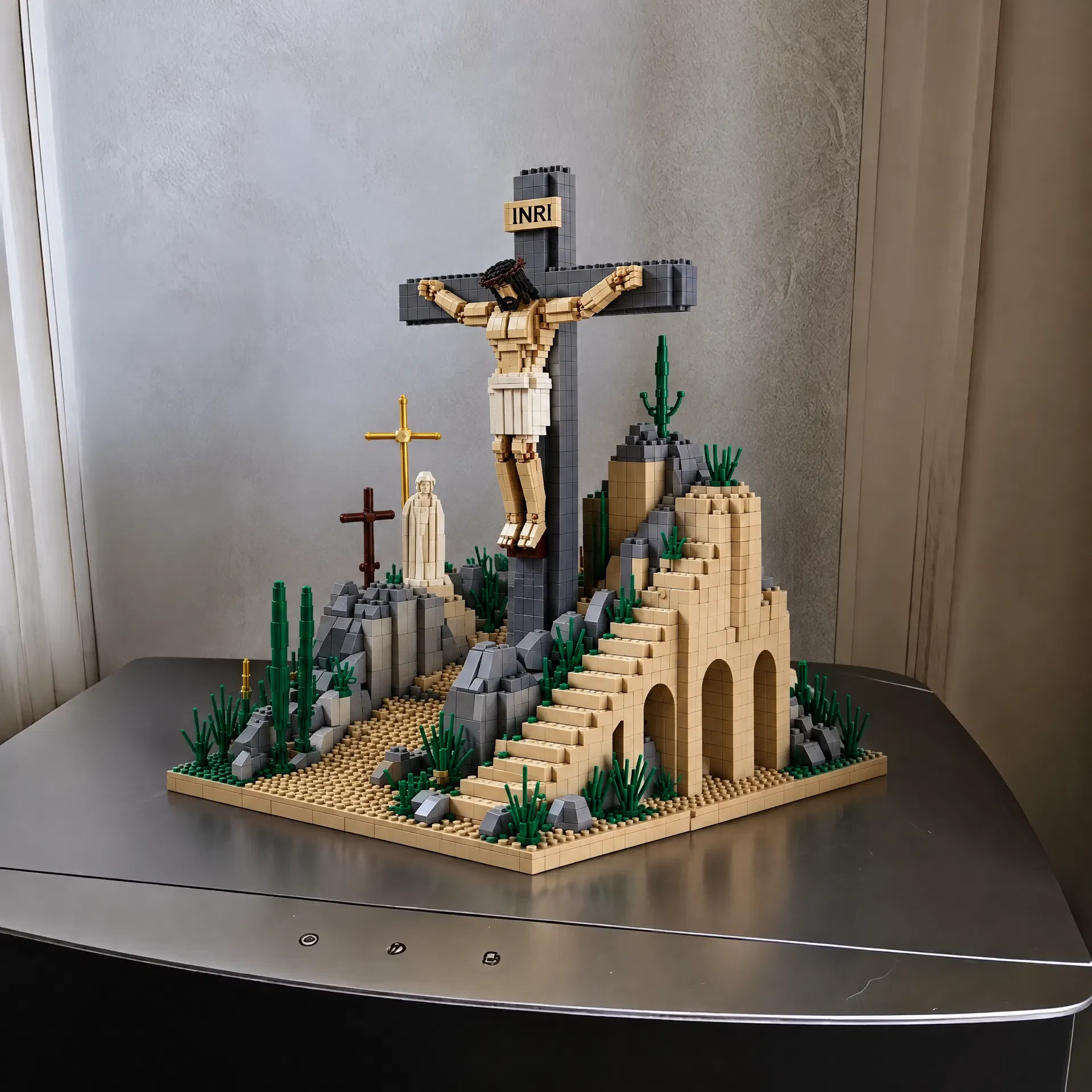 Crucifixion scene building model on a cabinet
