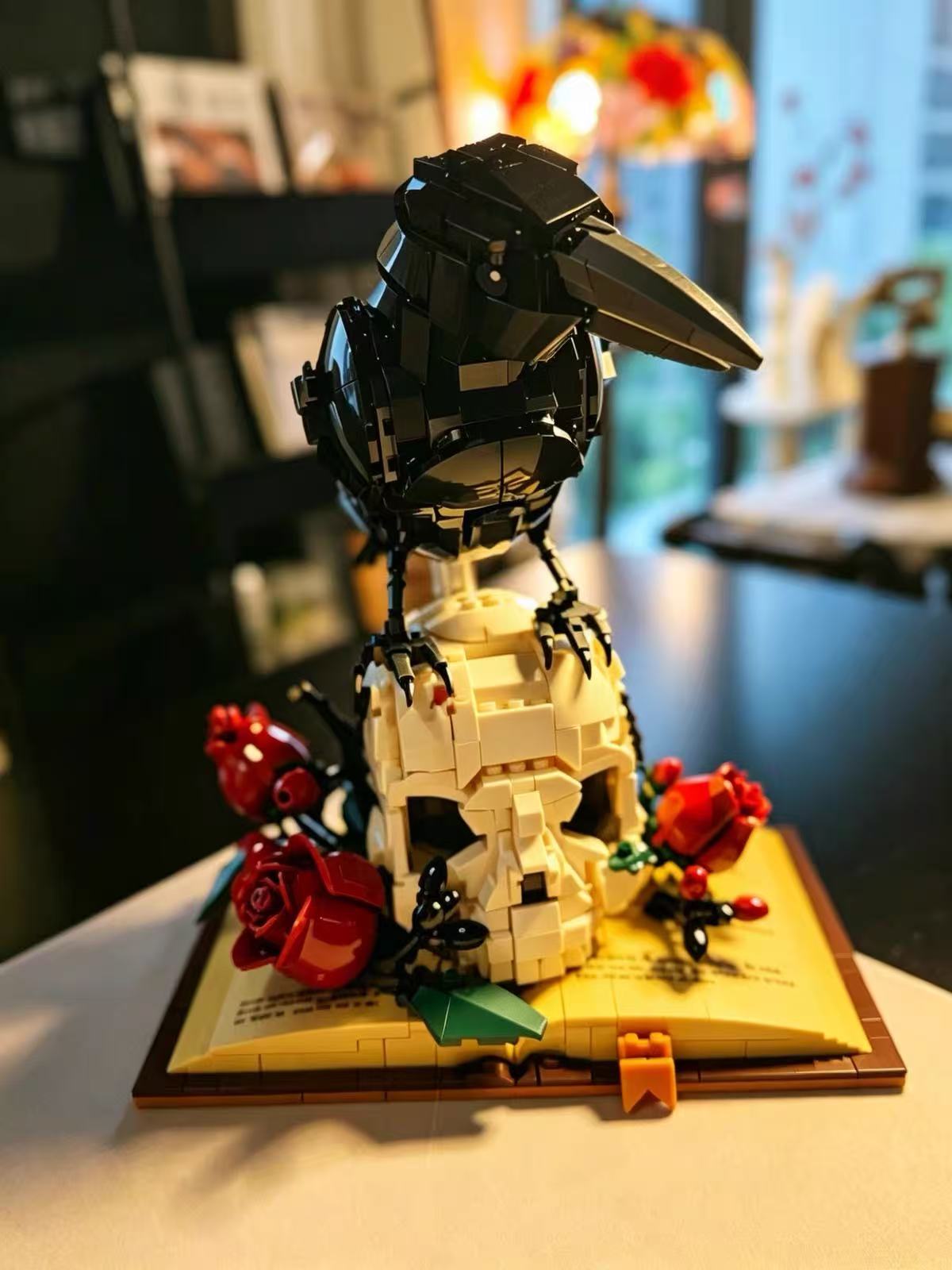 Black bird and skull building model on a display base
