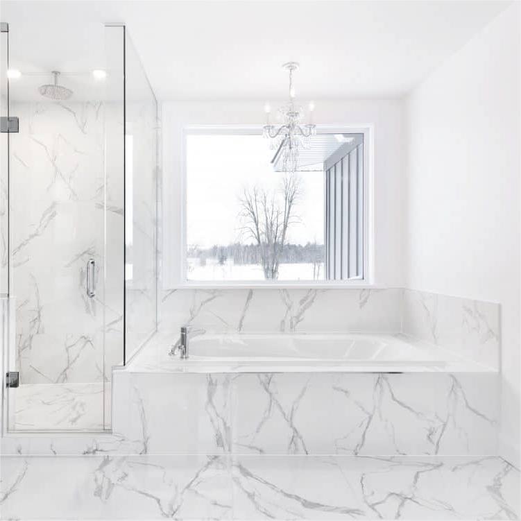 Undermount tub keeps the water warm for longer. Sit flush with three sides