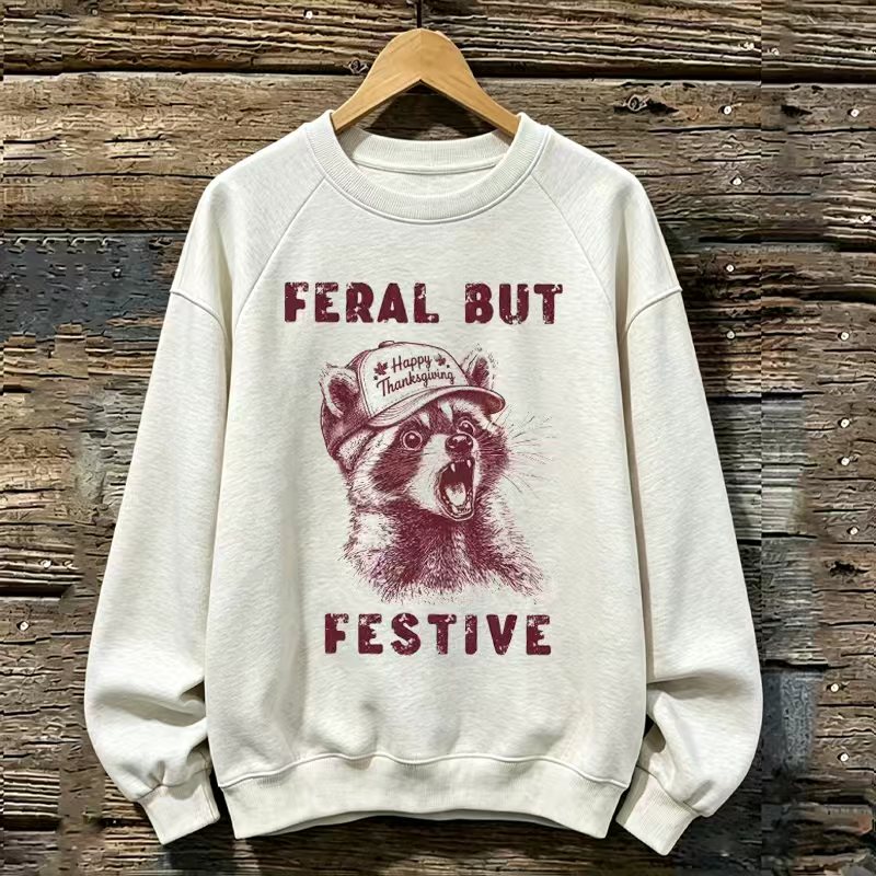 Feral But Festive Raccoon Sweatshirt