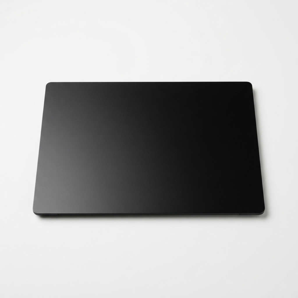 Black matte laptop screen protector sheet on matte off-white background