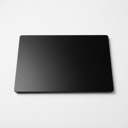 Black matte laptop screen protector sheet on matte off-white background