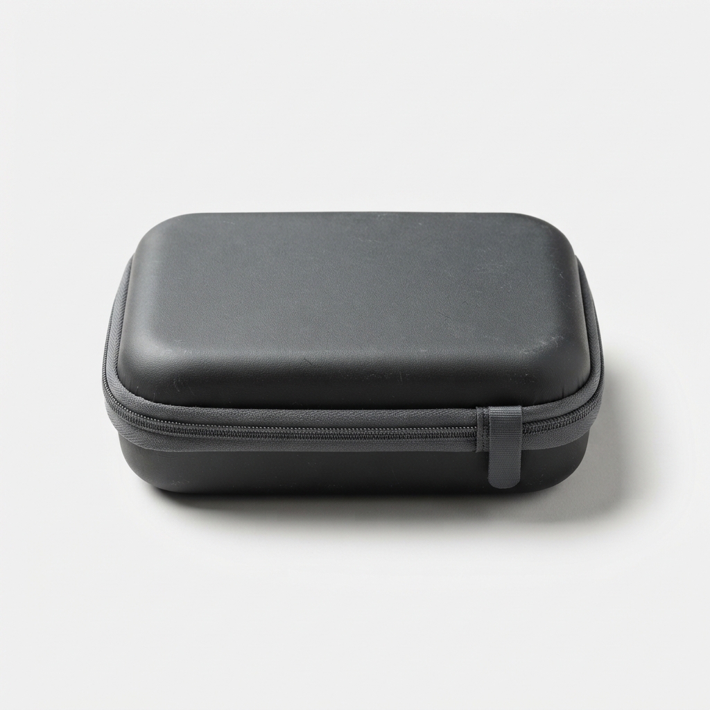 Dark gray hard travel case for AI voice translator on matte off-white background