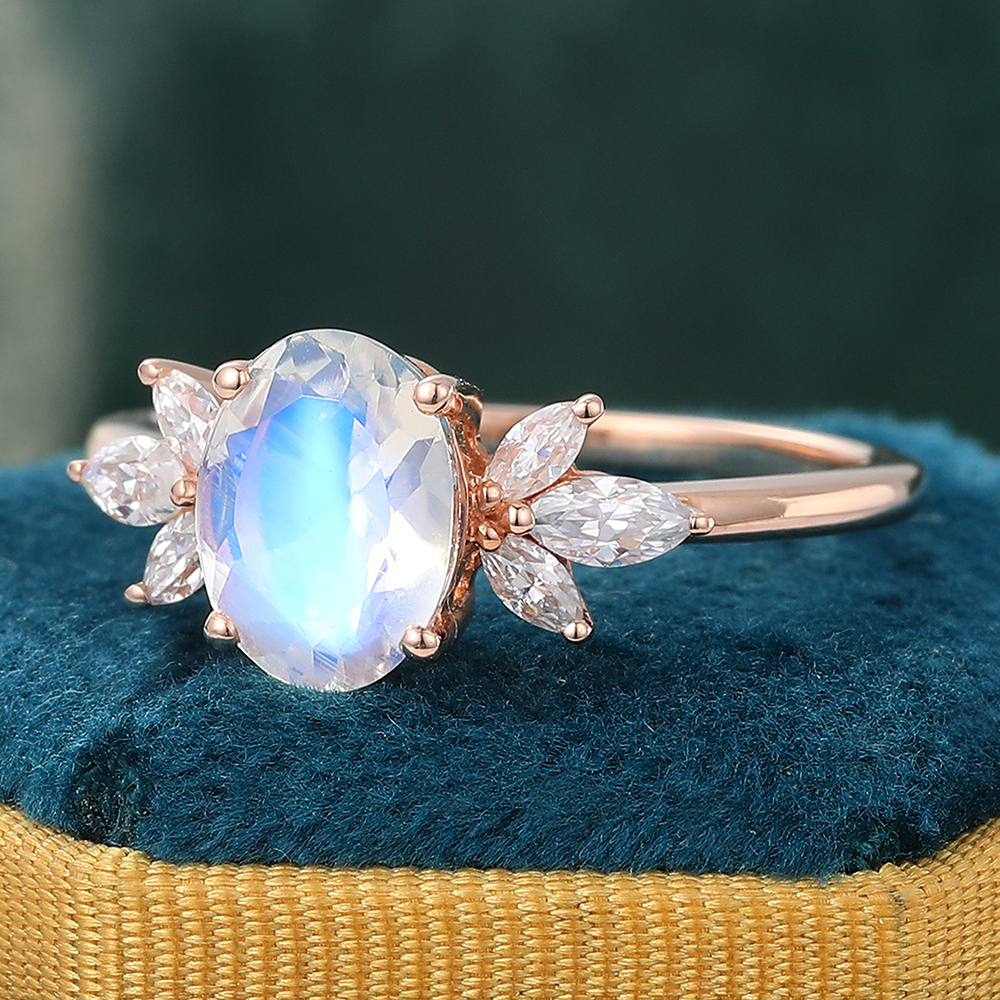 Juyoyo Oval Cut Moonstone and Diamond Side Stone Engagement Ring