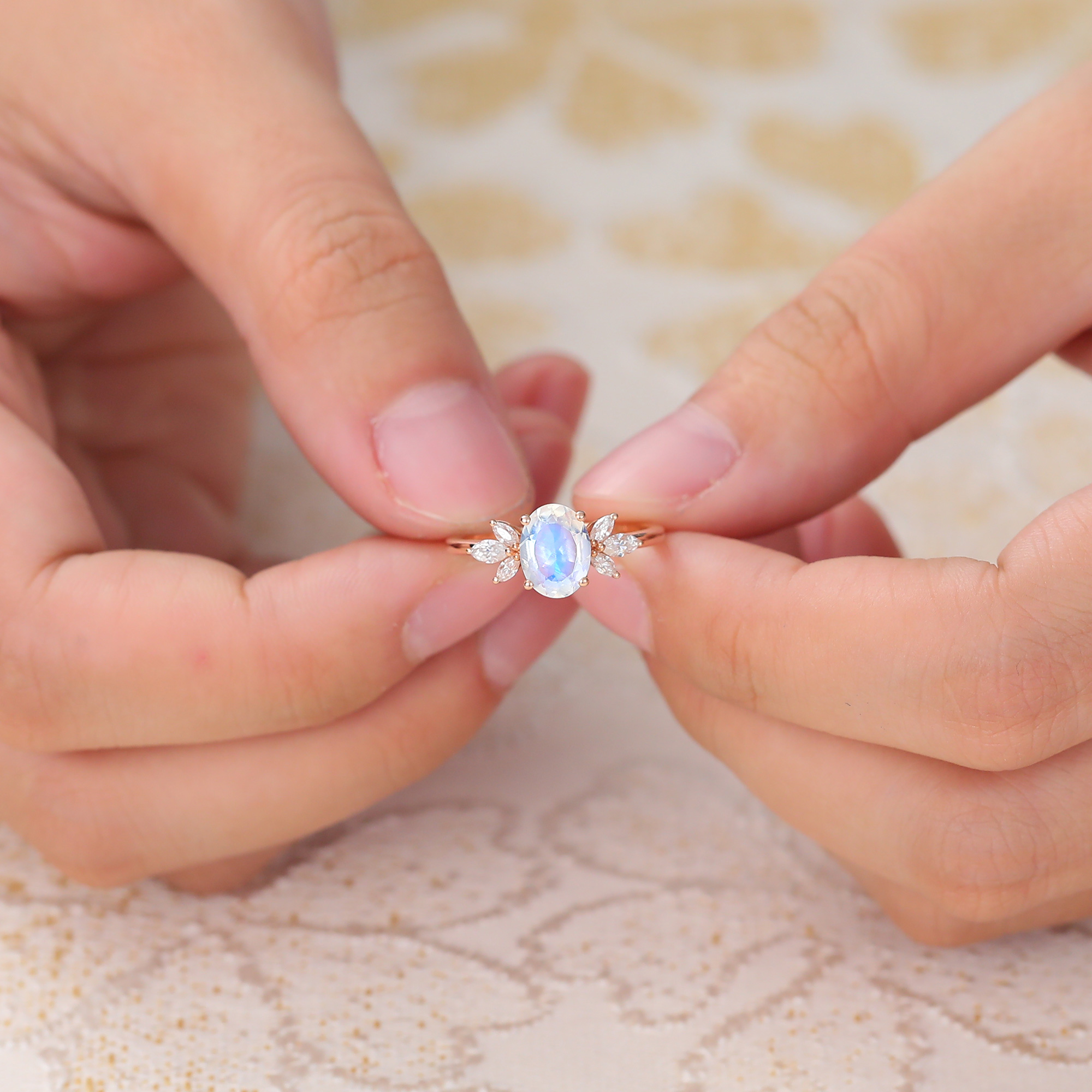 Juyoyo Oval Cut Moonstone and Diamond Side Stone Engagement Ring