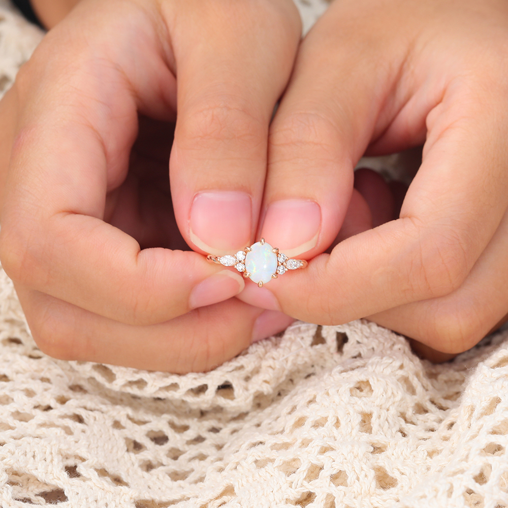 Juyoyo oval cut opal rose gold twisted engagement ring