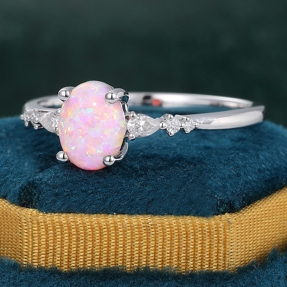 Juyoyo Simple 6*8mm Oval Cut Lab Pink Opal Engagement Ring with Diamond Accents