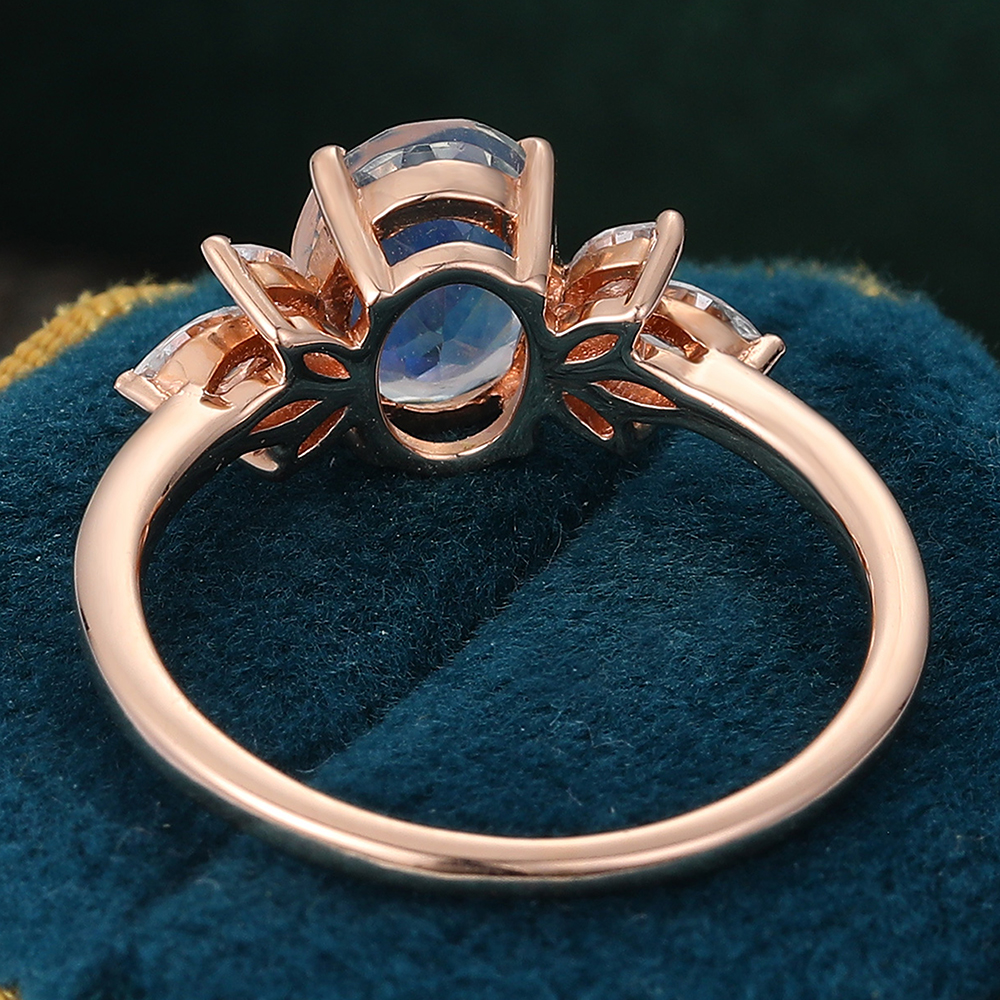 Juyoyo Oval Cut Moonstone and Diamond Side Stone Engagement Ring