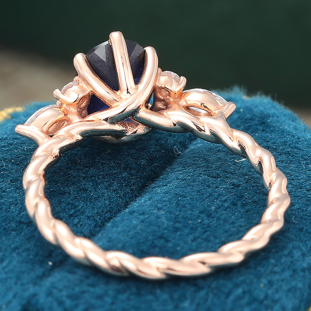 Juyoyo Oval Cut Lab Sapphire Rose Gold Twisted Engagement Ring