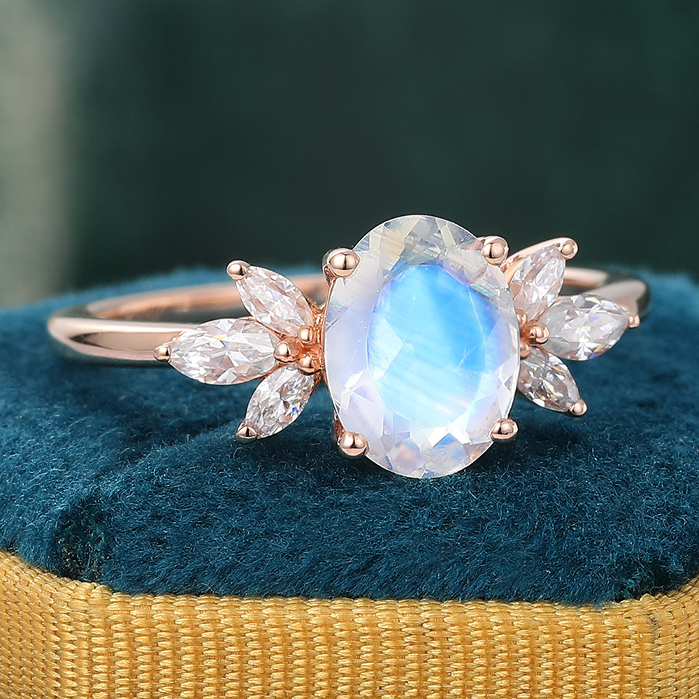 Juyoyo Oval Cut Moonstone and Diamond Side Stone Engagement Ring