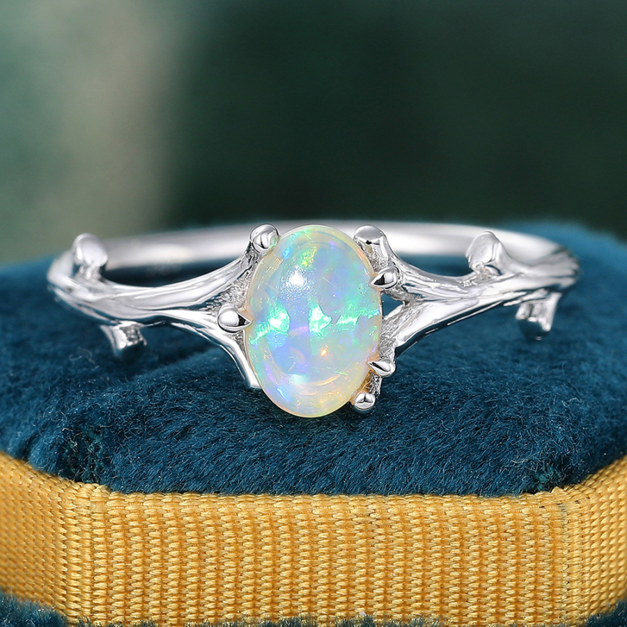 Delicate Oval Cut Opal Solitaire Engagement Ring Nature Inspired Tree Branch Ring