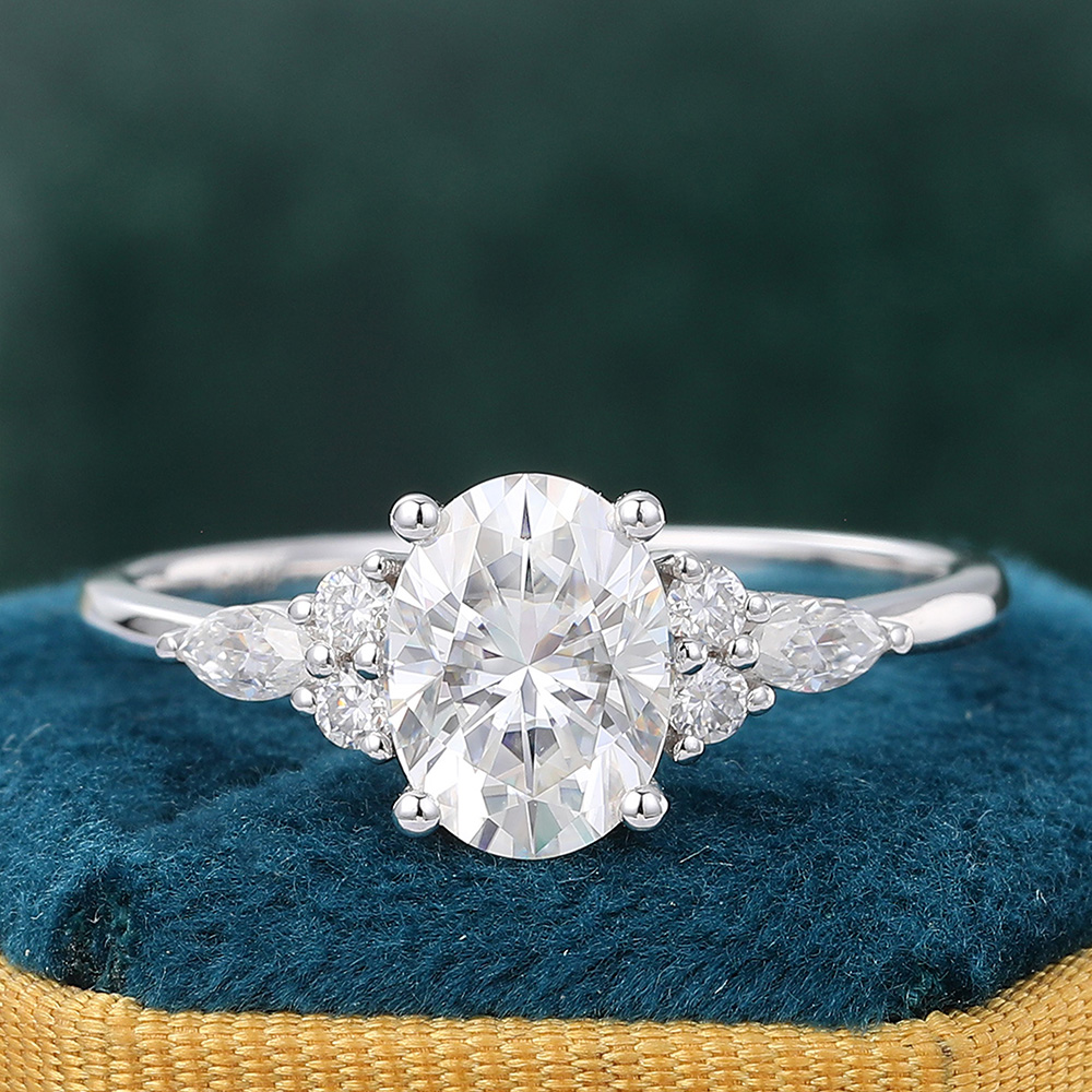 6x8mm Oval Moissanite Engagement Ring with Diamond Accents in White Gold