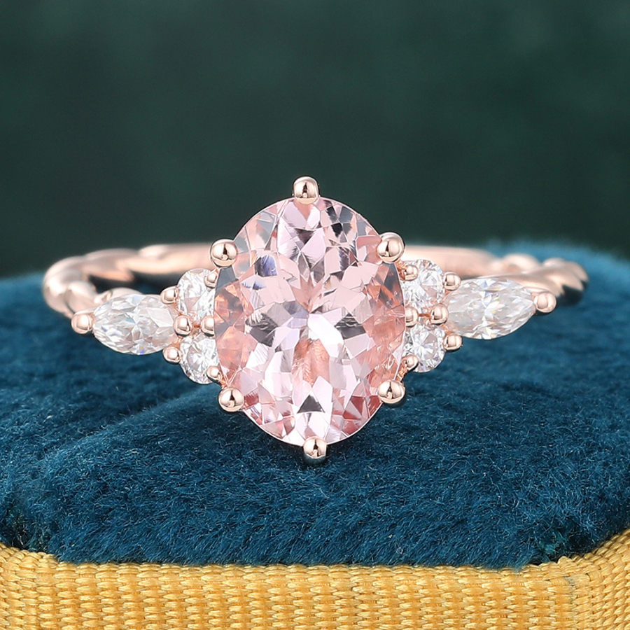 Twisted Oval Cut Morganite Side Stone Engagement Ring with Diamond Accents