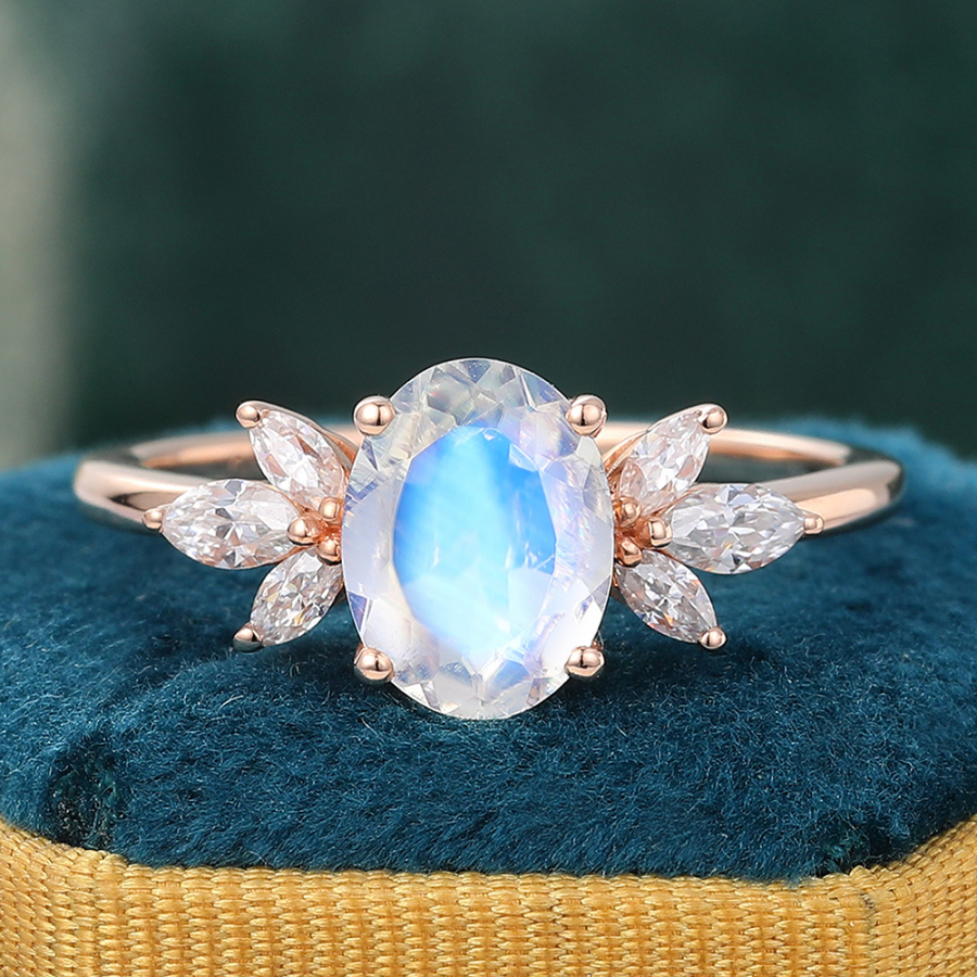 Oval Cut Moonstone and Diamond Side Stone Engagement Ring