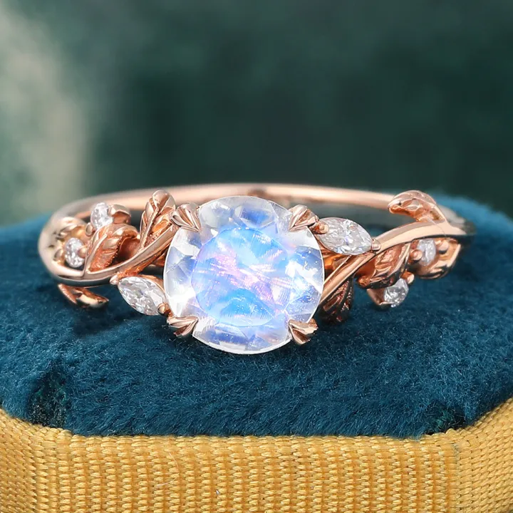 Nature-Inspired Round Moonstone Vine Engagement Ring with Moissanite Accents