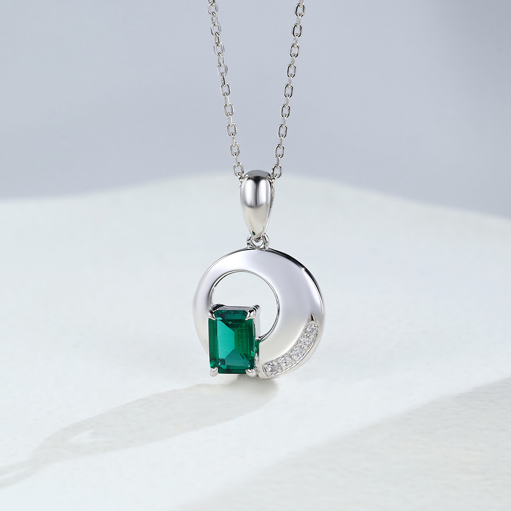 white gold Emerald necklace
