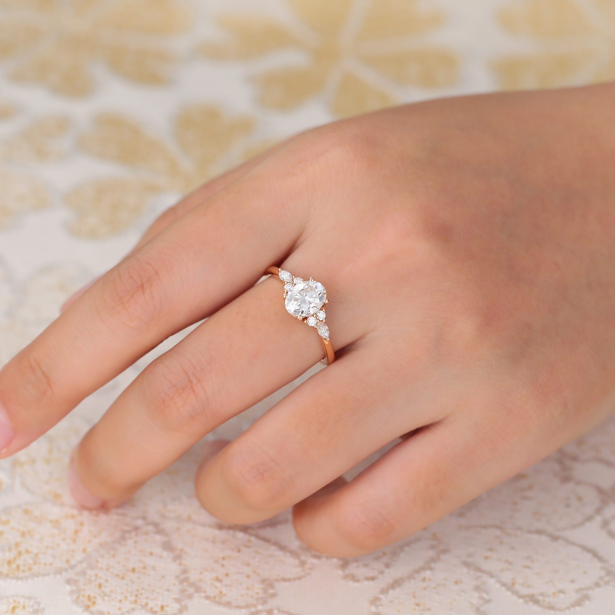 6x8mm Oval Moissanite Engagement Ring with Diamond Accents in Rose Gold