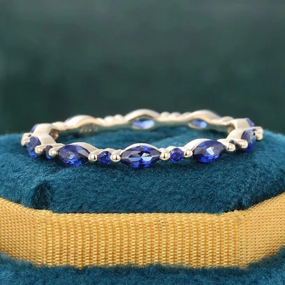 blue sapphire eternity wedding band