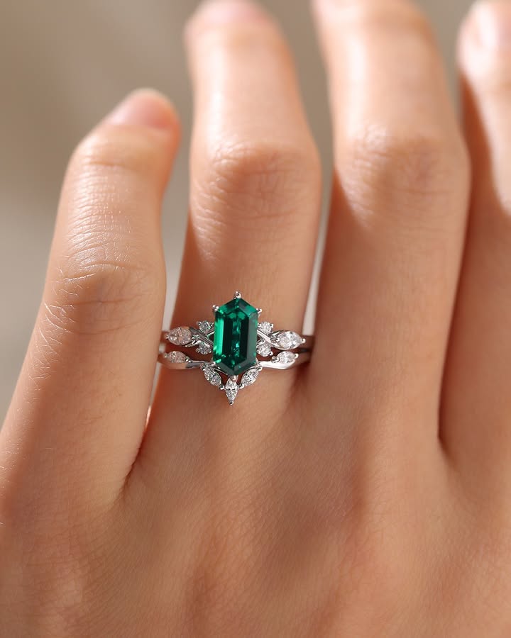 emerald and diamond engagement ring