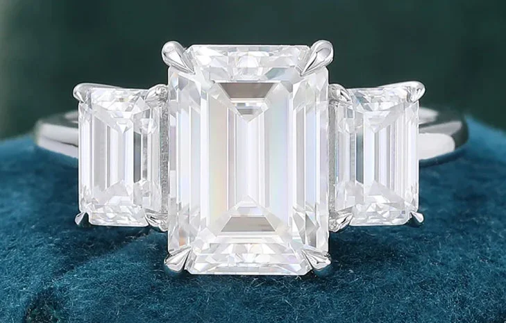 emerald cut moissanite engagement ring in sterling silver
