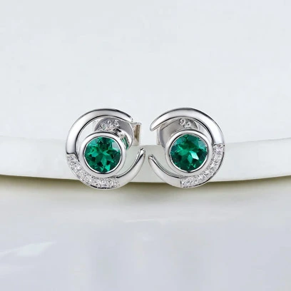 emerald white sapphire crescent earrings