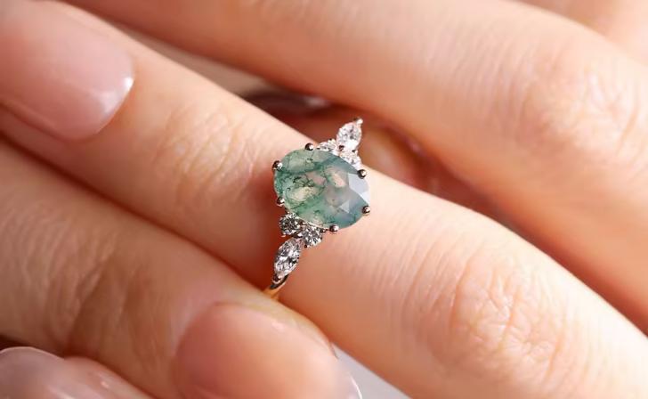 Oval Cut Moss Agate Twisted Engagement Ring with Moissanite Accents in Rose Gold