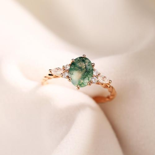 Oval Cut Moss Agate Twisted Engagement Ring with Moissanite Accents in Rose Gold