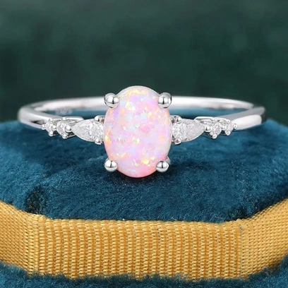 pink opal engagement ring moissanite sidestones
