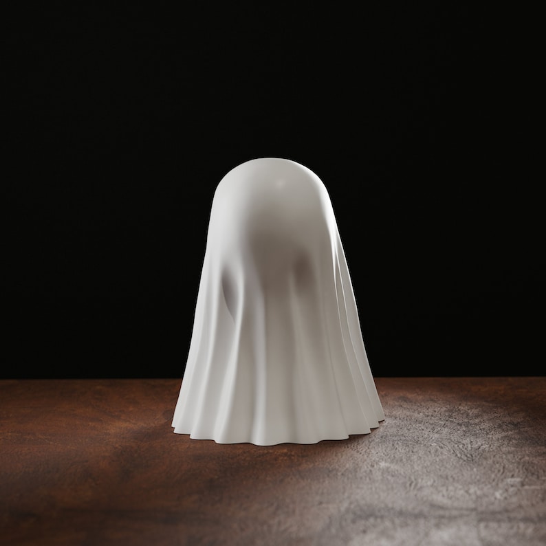 funny Ghost figurine showing the middle finger