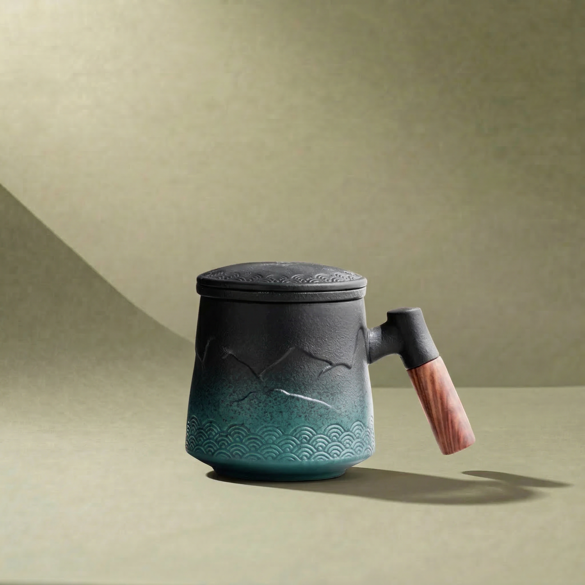 “Mountain” - Embossed Ceramic Tea Mug With Wooden Handle and Removable Infuser