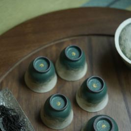 Lake Veil full Jingdezhen tea set styled on a tea tray &mdash; teapot, gaiwan, fair cups and tea cups in use
