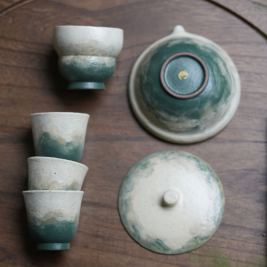 Lake Veil tea set detail shot &mdash; multiple pieces showing complementary glaze tones