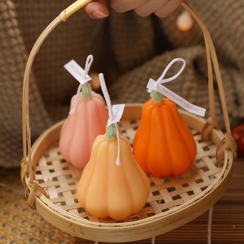 three packs of tall Pumpkin Aromatherapy Candle