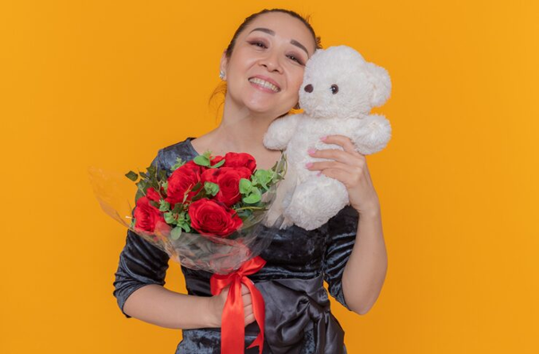 Woman Holding Teddy Bear