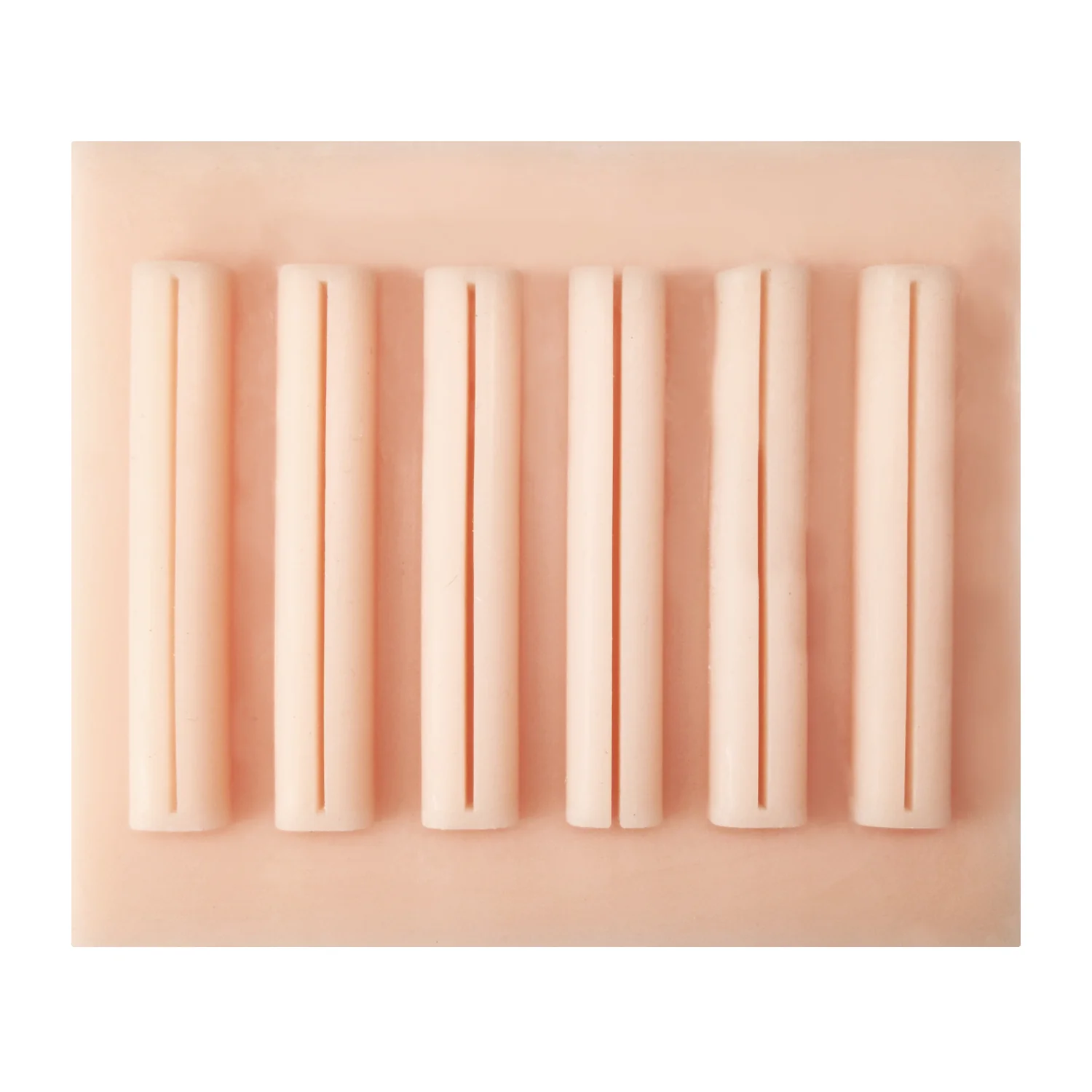 Silicone laparoscopic suturing trainer for medical education
