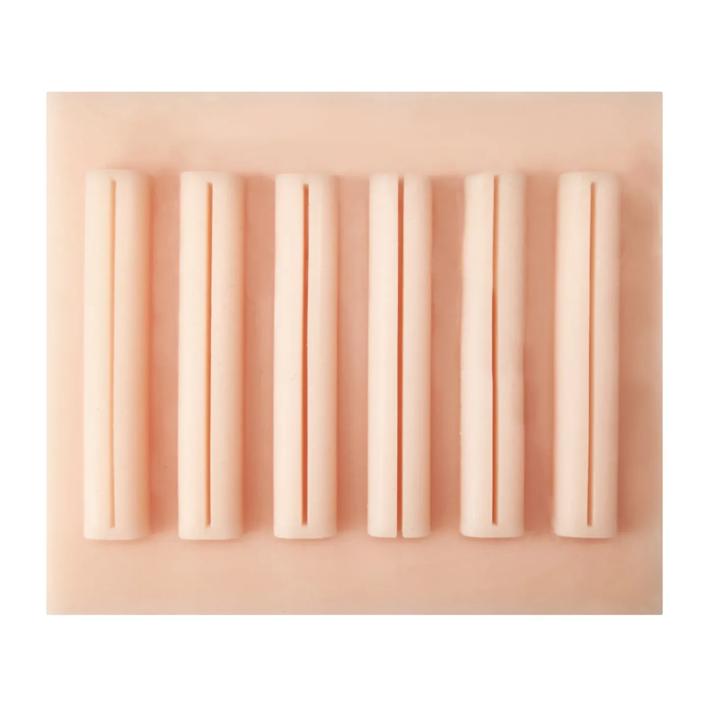 Silicone laparoscopic suturing trainer for medical education