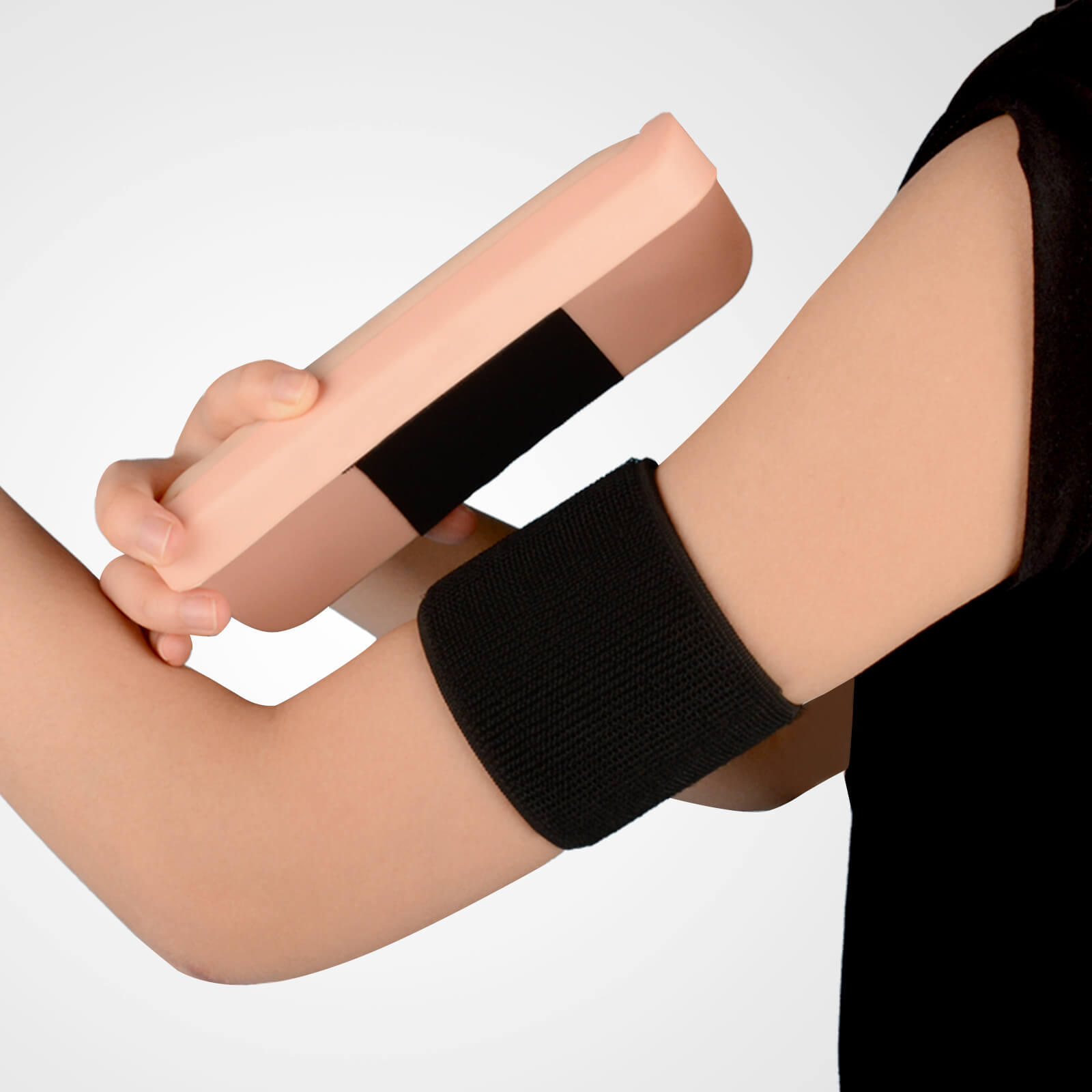 Wearable skin suture pad secured to arm for wound closure training
