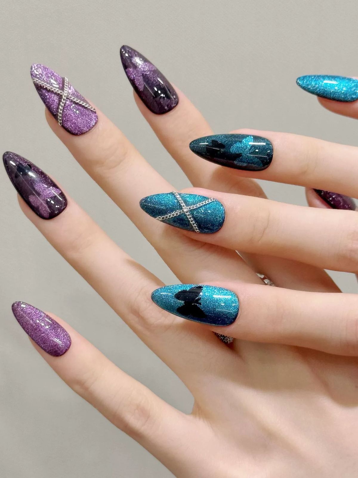 Glitzy Gothic Blue Nails