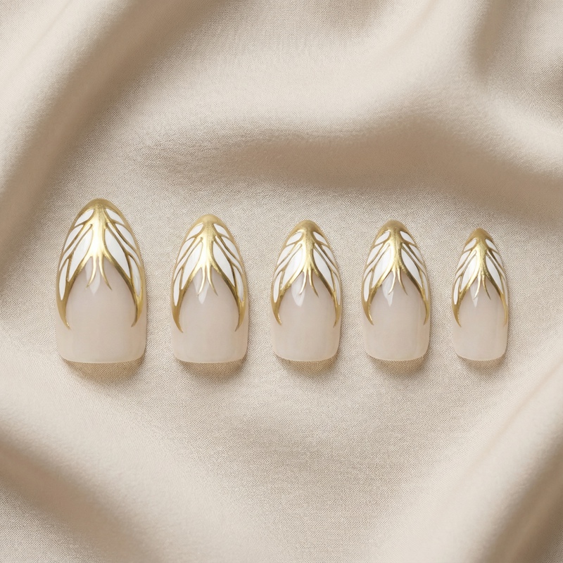 Winged Luxe Gold Nails