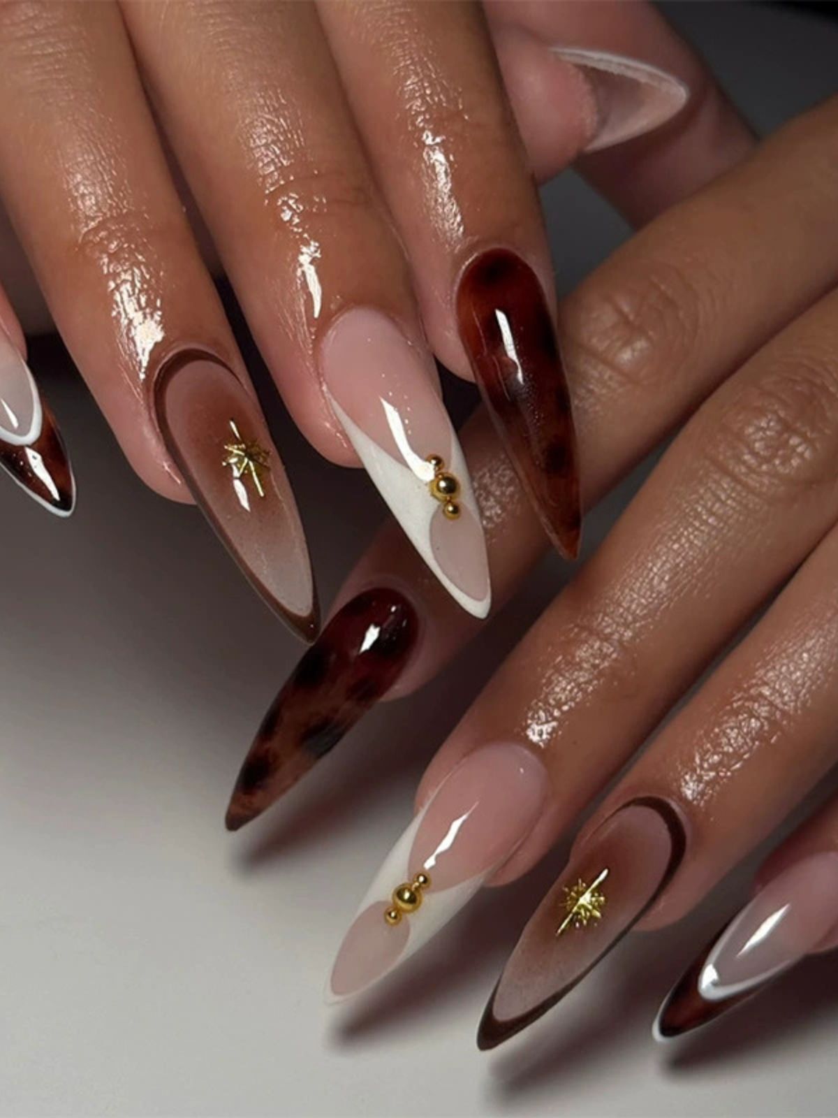 Tortoise Luxe Red Nails