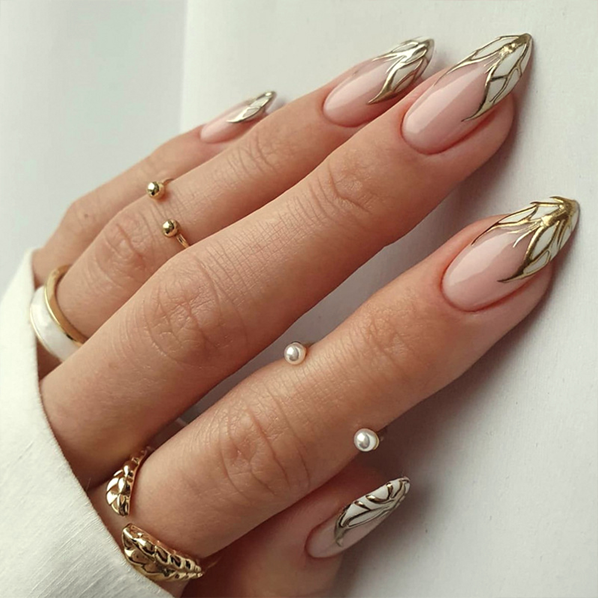 Winged Luxe Gold Nails
