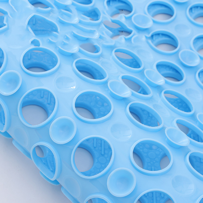 Fast drainage holes in shower mat