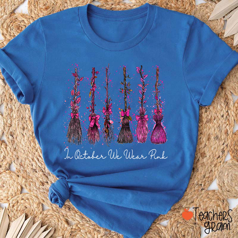 On Wednesday We Wear Pink Witch Broom Teacher T-Shirt
