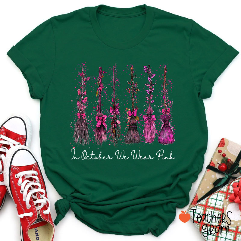 On Wednesday We Wear Pink Witch Broom Teacher T-Shirt