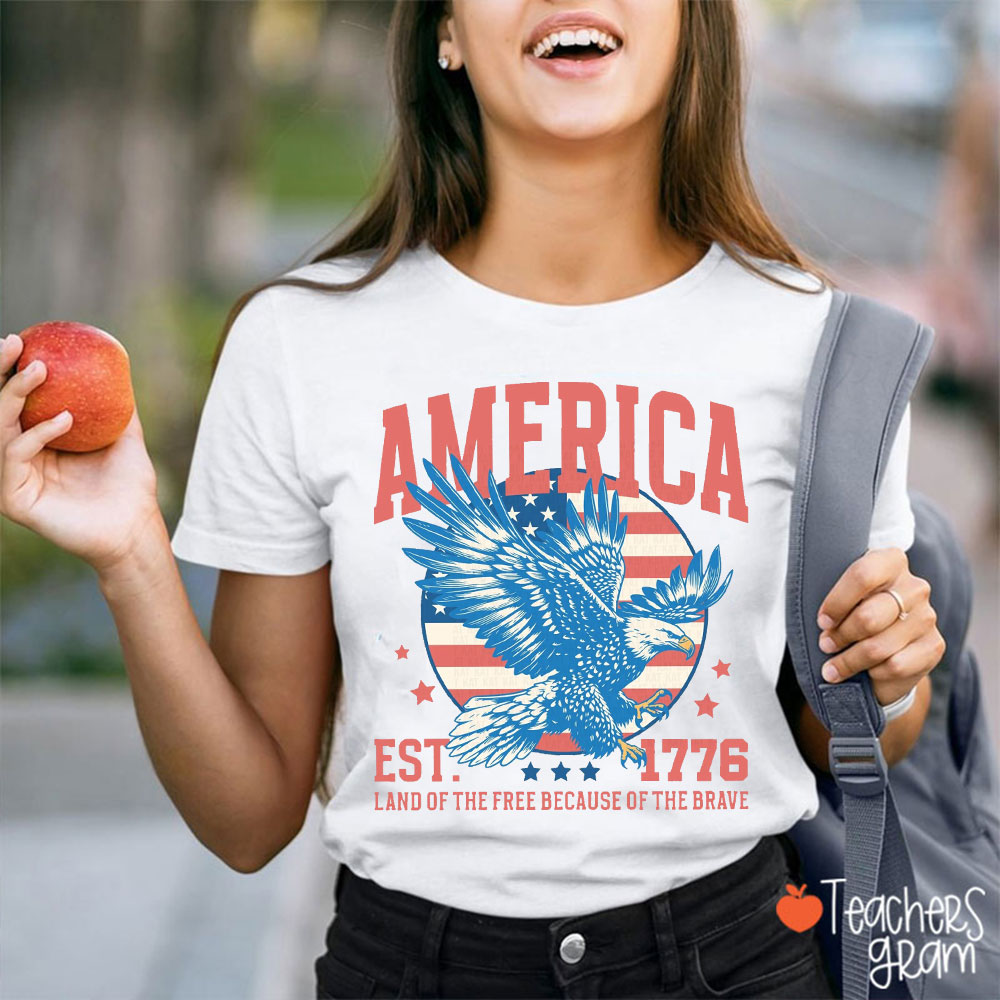 America EST 1776 Land Of The Free Because Of The Brave Teacher T-Shirt