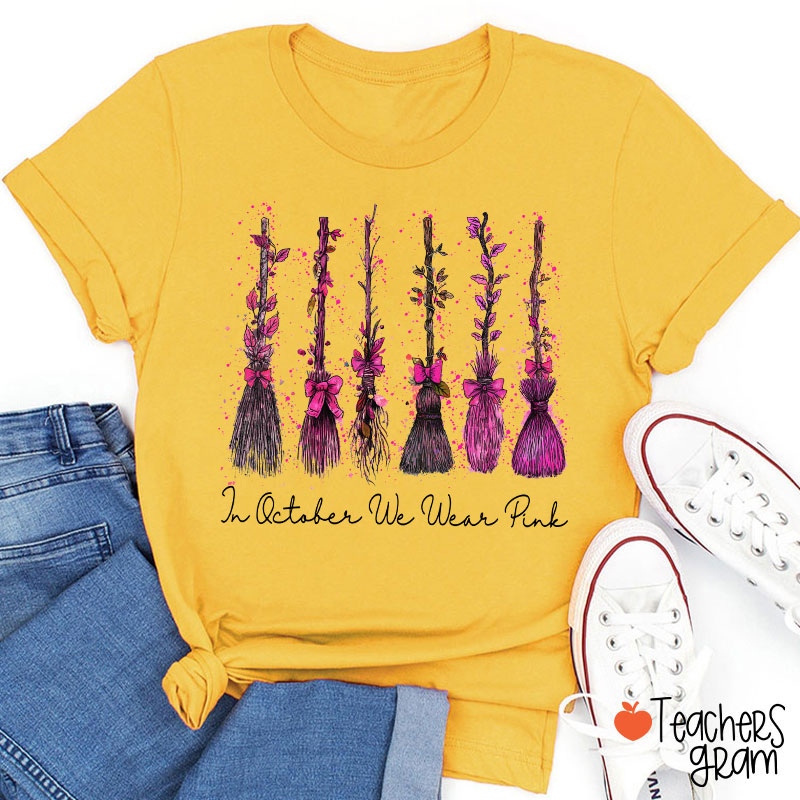 On Wednesday We Wear Pink Witch Broom Teacher T-Shirt