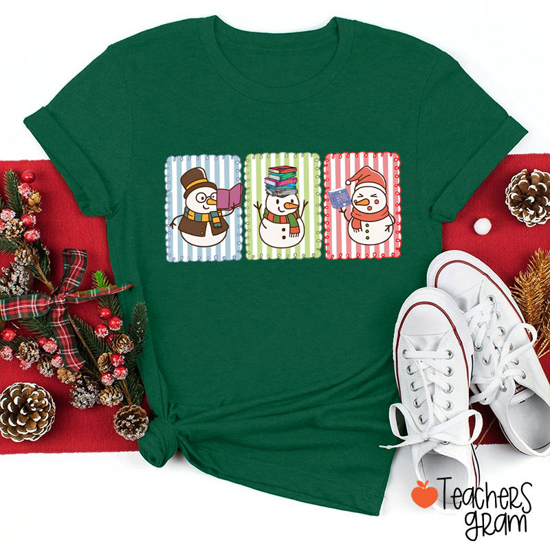 Cute Snowman Reading Books In Winter Teacher T-Shirt
