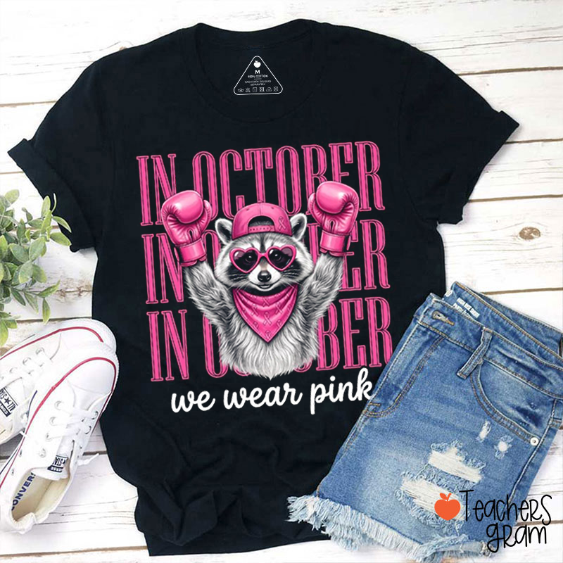 Pink Ribbon Raccoon In October We Wear Pink Awareness Teacher T‑Shirt
