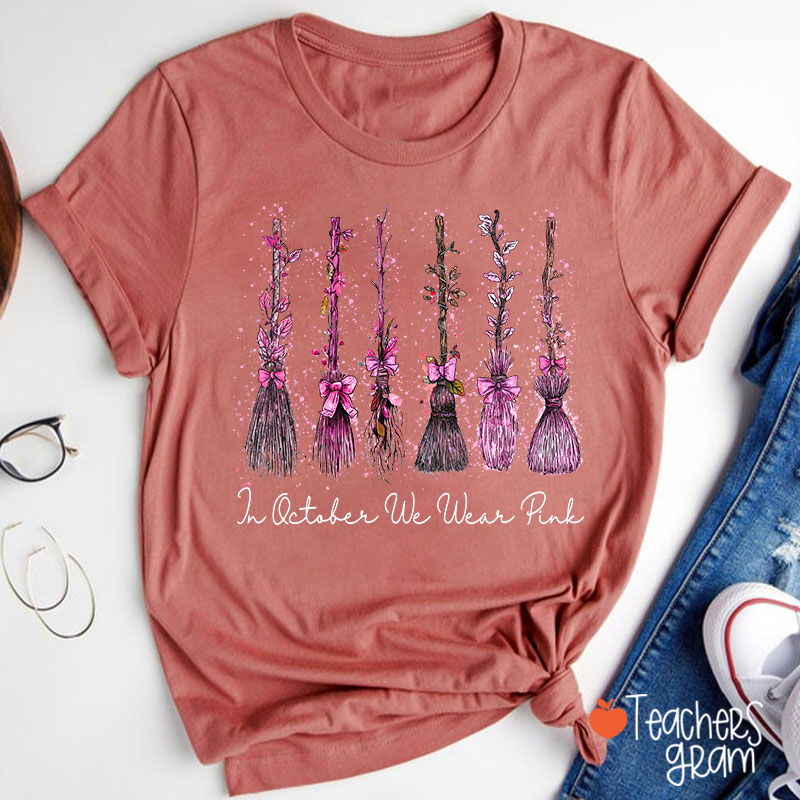 On Wednesday We Wear Pink Witch Broom Teacher T-Shirt